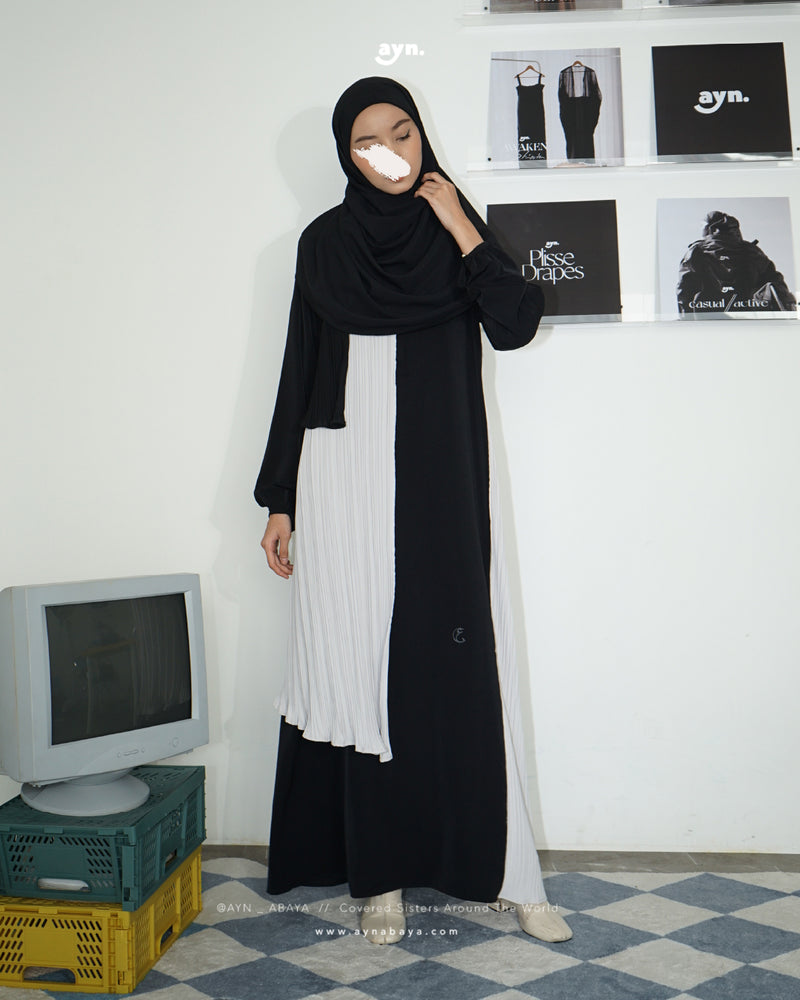 AYN PLISSE ASYMETRICAL LONG SHIRT