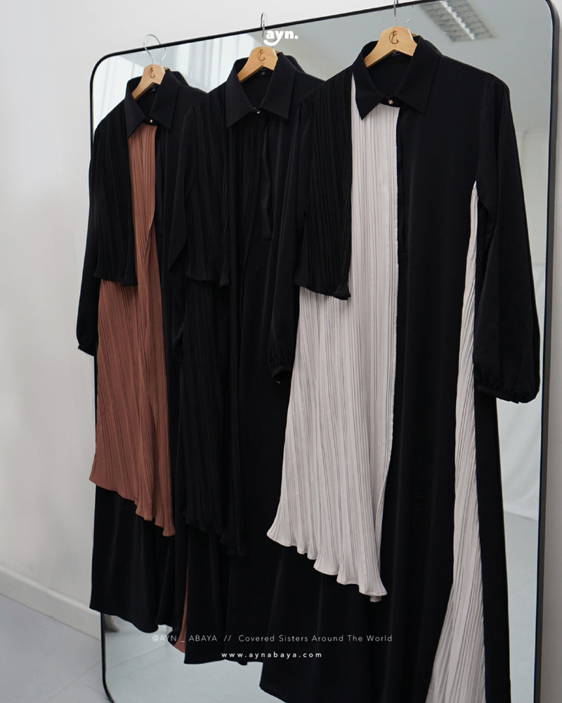 AYN PLISSE ASYMETRICAL LONG SHIRT