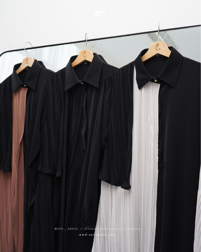 AYN PLISSE ASYMETRICAL LONG SHIRT