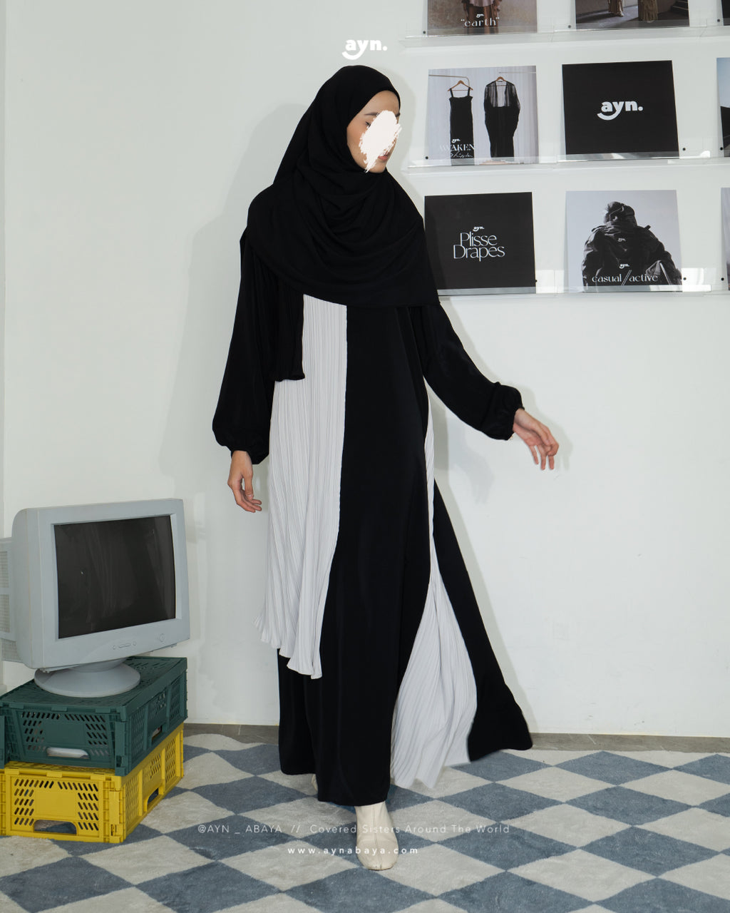 AYN PLISSE ASYMETRICAL LONG SHIRT
